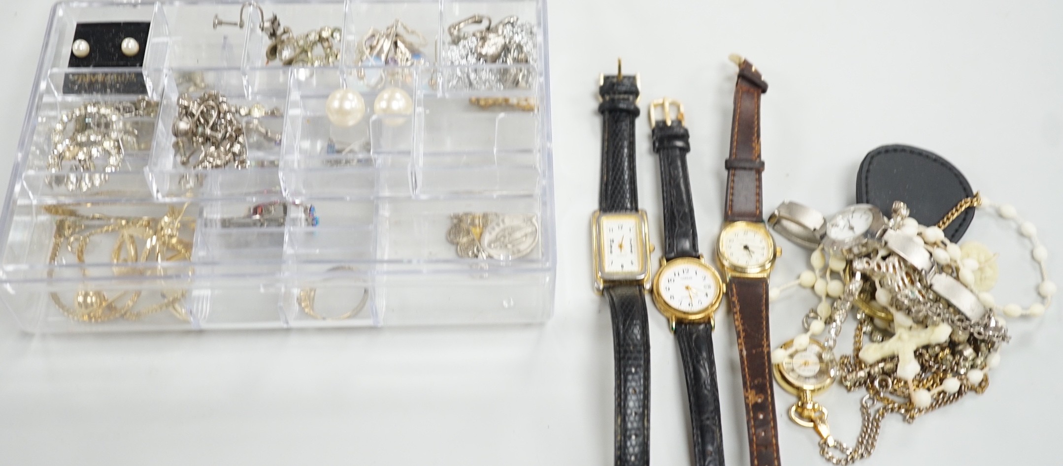 A small quantity of assorted costume jewellery and wrist watches.